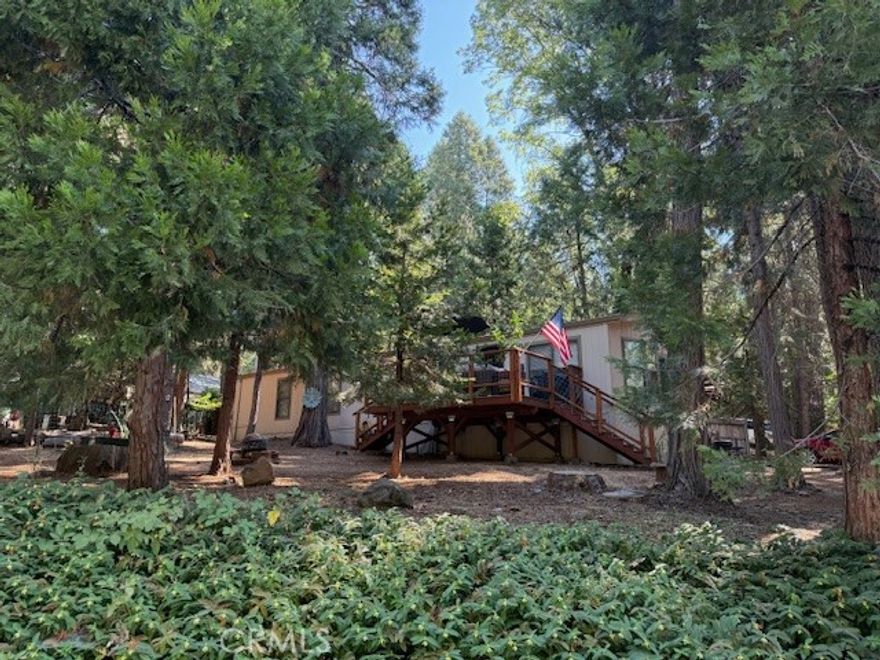 Welcome to this beautiful home that is sitting up on a hill over looking Kilgord Court.  This home is on a large cleared lot that has been meticulously taken care of and spares no detail.  From a dumb waiter to load your groceries right into the laundry room or your wood in the winters to the large attached covered carport, this home has checked all the boxes. You walk up the driveway that leads to a pathway to a welcoming set of stairs leading up to the relaxing stylish new deck that overlooks the whole corner through the beautiful trees.  Enter into the front door with a strong security screen so that you may enjoy those cooler summer nights,  into the living room that boasts of high ceilings and a large family great room open to the dinning room and kitchen.  Note the new top loading wood burning stove that was just put in two years ago with all new heat efficient pipping keeping the home heated through out the winters.  The Kitchen has all new appliances from the Fridge to the microwave to the dishwasher to the electric range.  The home is all electric so no astronomical propane bills!  The best part of this two bedroom modular is the size of the second bedroom.... it is like having two master bedrooms!  The new central HVAC unit is super sized to assure a very comfortable home.  So many pluses with this beautiful home.  It truly is a must see.  All this modular home is waiting for is your personal touch. 



Please ask about the furniture: Couches, Dinning room table and chairs, Master bedroom set and new temperpetic adjustable bed. Seller would like to sell these separately. Also the generator and the trailer. :)