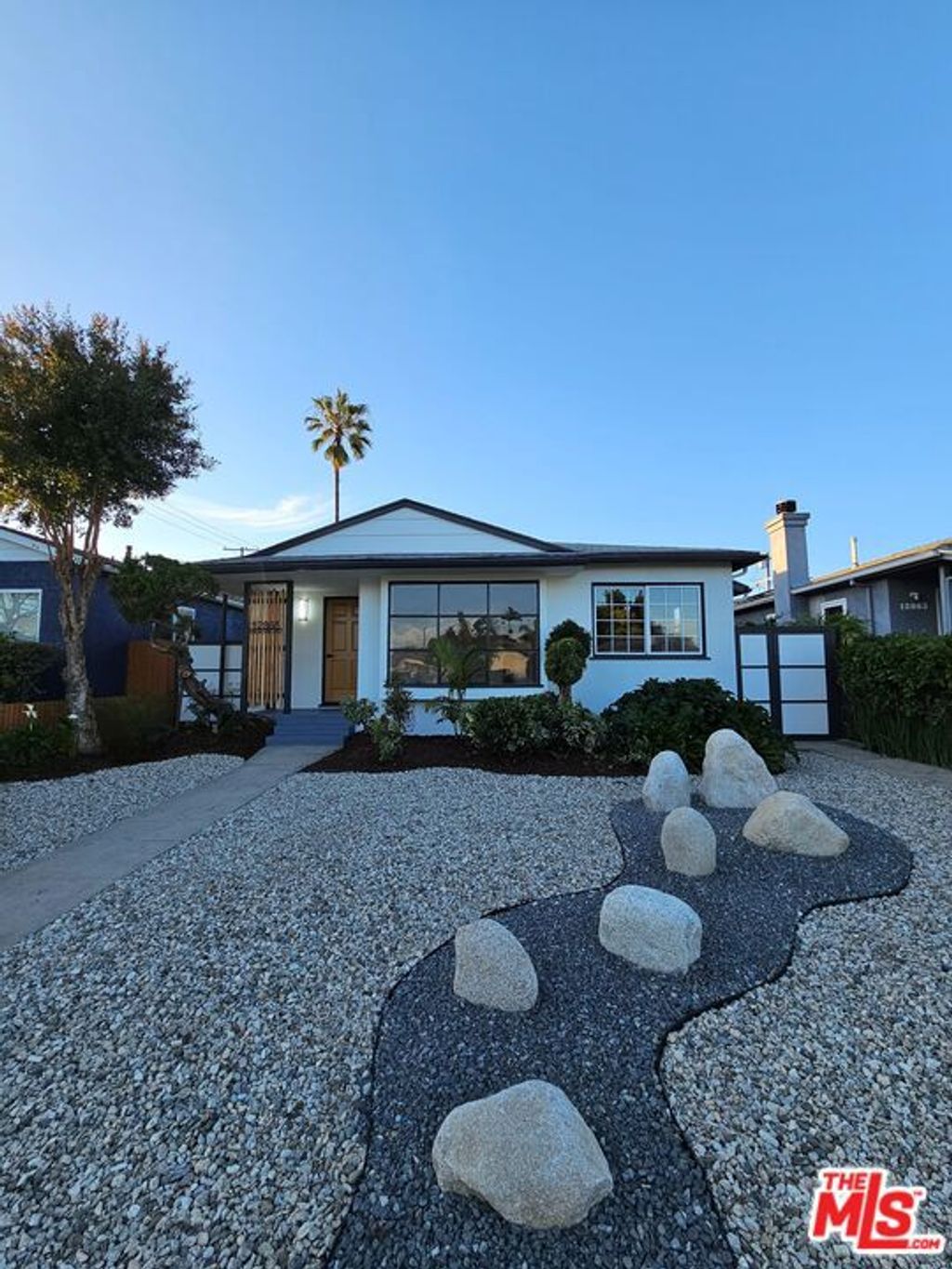 Photo of 12865 Gilmore Avenue, Los Angeles, CA 90066 (MLS # 26664513)