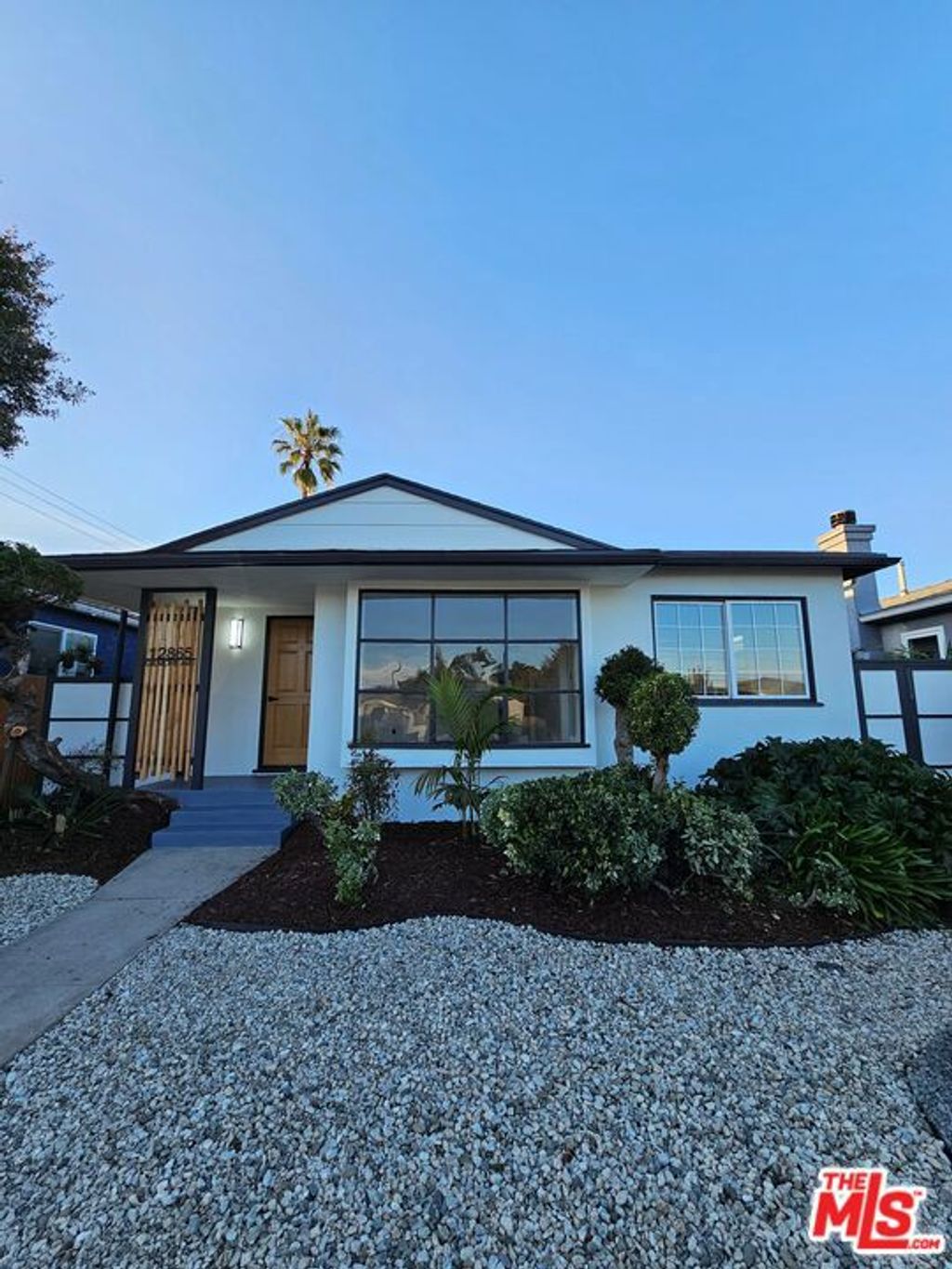 Photo of 12865 Gilmore Avenue, Los Angeles, CA 90066 (MLS # 26664513)