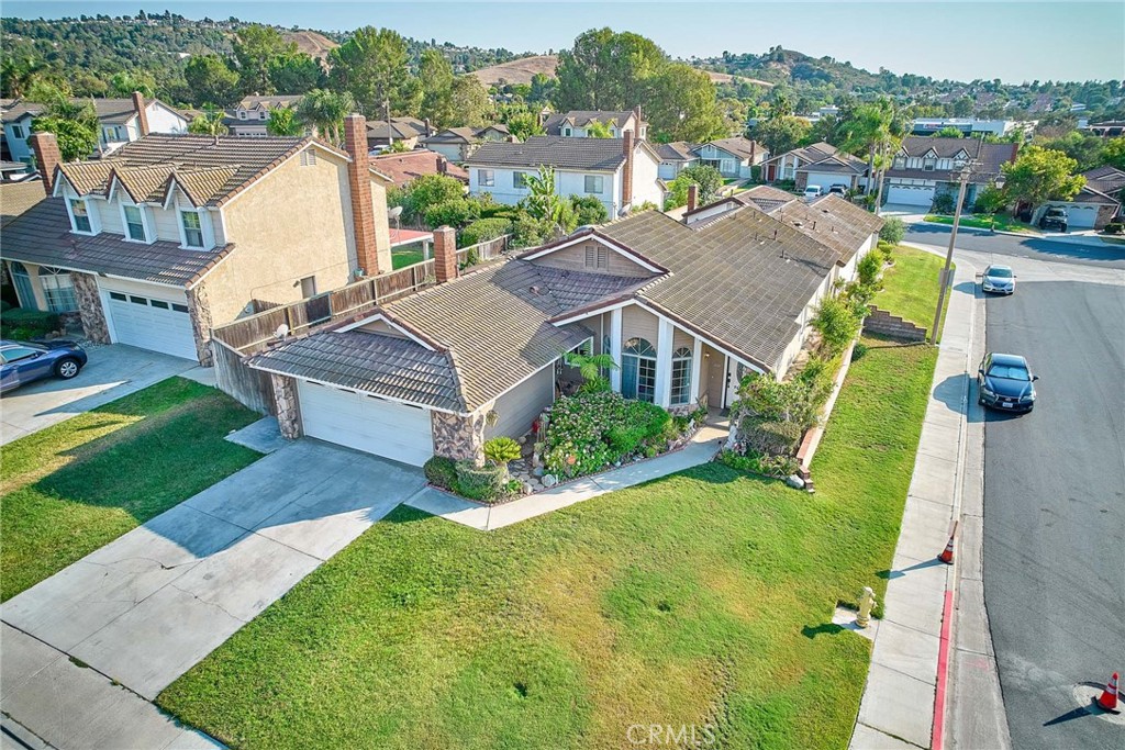 Great location- Corner lot, Four bedroom and 2 full baths, Good size 1618 SQFT of Living Space, wood floors in living room, dining room and Kitchen areas. Fireplace in the living room. Priced for quick sale.