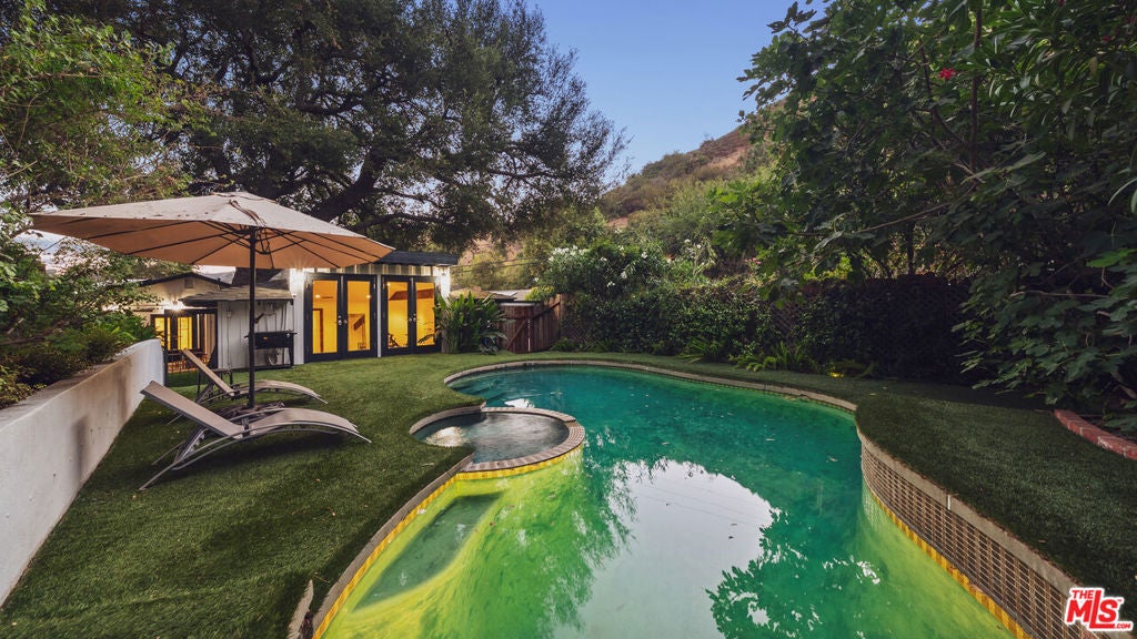 Photo of 3440 Mandeville Canyon Road, Los Angeles, CA 90049 (MLS # 26104142)