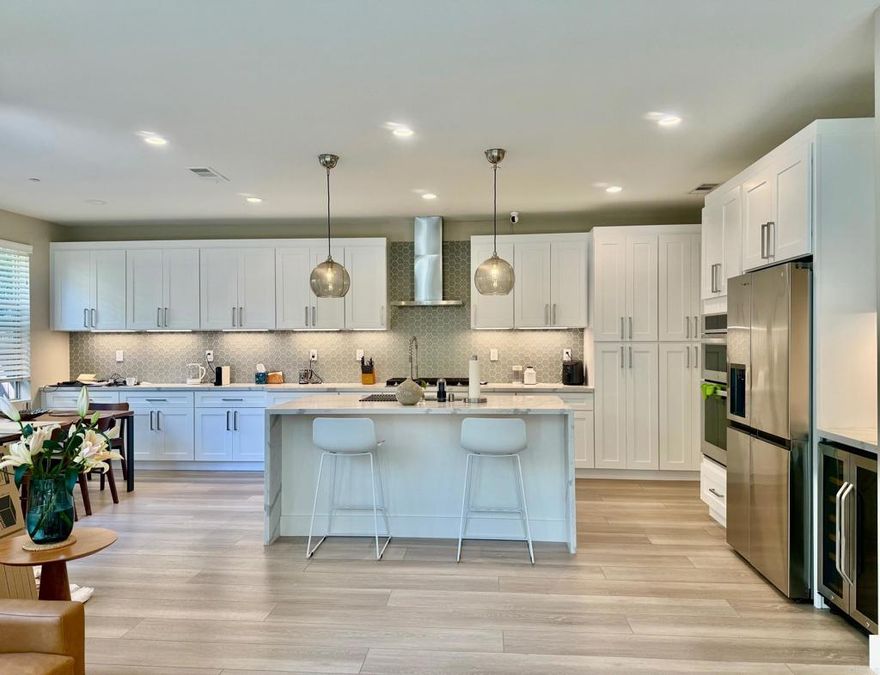 Available Jan 1st Step into sleek, sophisticated living in this impeccably upgraded 3-bedroom, 2.5-bath home located in a Del Sur Neighborhood. With stunning designer touches, smart features, and an airy open floor plan, this home is the perfect blend of luxury and comfort.Spacious 2-car garage + extra dedicated parking space.    Modern Living Space: -Light-filled open-concept living room with floor-to-ceiling glass sliders. Seamless flow from living to kitchen and dining perfect for entertaining Custom wide-plank luxury vinyl flooring throughout   Gourmet Chef's Kitchen Fully Upgraded: Sleek white shaker cabinetry with soft-close drawers and abundant storage Designer hex tile backsplash and Calacatta quartz countertops Oversized center island with waterfall edge + bar seating Premium stainless steel appliance suite (gas range, double oven, wine fridge, and more) Modern pendant lighting + under-cabinet LEDs for a chic, functional aesthetic   Outdoor/Indoor Living: Private, lushly landscaped patio space ideal for al fresco dining or relaxing   Additional Highlights: Spacious primary suite with ensuite bath  Central A/C + smart thermostat In-home washer/dryer hookups High ceilings, recessed lighting, and designer finishes throughout, solar included- low electric bills as well as 240V outlet in garage.   Prime Location Minutes from top-rated schools, shopping, dining, and commuter routes. This is not your average rental it's a modern masterpiece with upgrades​​‌​​​​‌​​‌‌​​‌​​​‌‌​​​‌​​‌‌​​​‌​‌​​​‌‌​ galore.