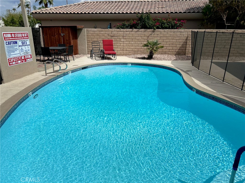 The property is comprised of four units, all single-story cottage style 2 bedroom, 1.5 bath units. The complex has a swimming pool, and each unit comes with 2 carport parking spaces. There are common laundry facilities at the property as well. All units come with new appliances including refrigerator.