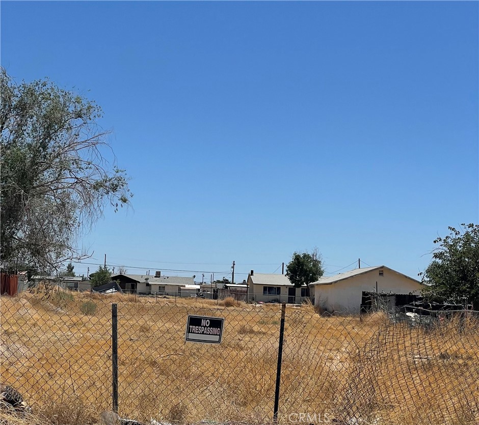 Another parcel for sale in the City of Adelanto boasts 9450 sq. ft. of real estate. The area consists of single-family and multi-family homes. Notably, the City of Adelanto has recently revised zoning regulations for Business Park, enhancing its commercial viability. The property profile indicates single-family residential, urging prospective buyers and their agents to conduct thorough due diligence. Situated adjacent to the bustling Southern California Logistics Airport and home to prominent companies such as Amazon, Snapple, Prologics, Rubbermaid, and Mars, the location presents unparalleled advantages. Don't miss out on this great opportunity, contact a trusted realtor today to submit your offer and seize the potential of this property. There are tow lots available for sale by the same owners, #69 & #70.