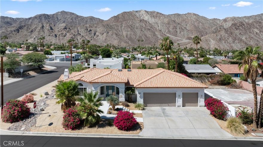 Exquisite Remodeled 5-Bedroom Estate in the Heart of La Quinta in the highly desirable, La Quinta Cove. A rare offering, this beautifully re imagined 5-bedroom residence rests on an expansive double lot, seamlessly blending elegance, functionality, and the best of desert living. The property boasts a generous four-car garage and dedicated RV parking, providing unparalleled versatility and convenience. Inside, sophisticated tile flooring flows gracefully throughout, accentuating soaring ceilings and an open-concept design that is perfect for both grand entertaining and everyday living. The kitchen and bathrooms have been meticulously remodeled, featuring contemporary finishes paired with timeless design elements, creating spaces that are as stylish as they are functional. Flooded with natural light, the home’s interiors evoke warmth and sophistication, while the expansive layout ensures comfort and privacy for family and guests alike. Whether envisioned as a full-time residence or an exceptional investment opportunity, this home presents a lifestyle of luxury and ease. Ideally located near world-class golf, shopping, dining, hiking, and biking trails, this property captures the very best of the La Quinta lifestyle.