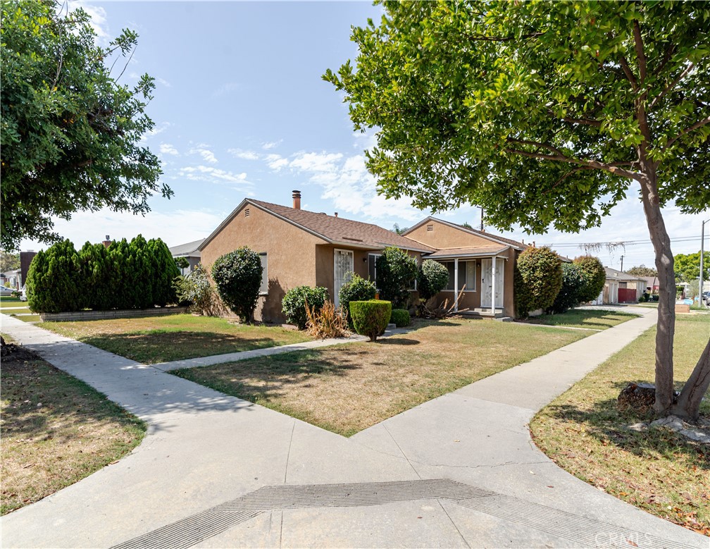 Calling all investors or buyers looking for income potential! Fixer duplex on a large corner lot in north Long Beach. Live in one unit and rent the other, or maximize income by adding an ADU/third small unit. This property includes 3 separate detached garages, one of which is large enough to have great ADU potential. Amazing opportunity for investors or owner-occupants. Convenient location near schools, shopping, and freeways. Trust Sale.