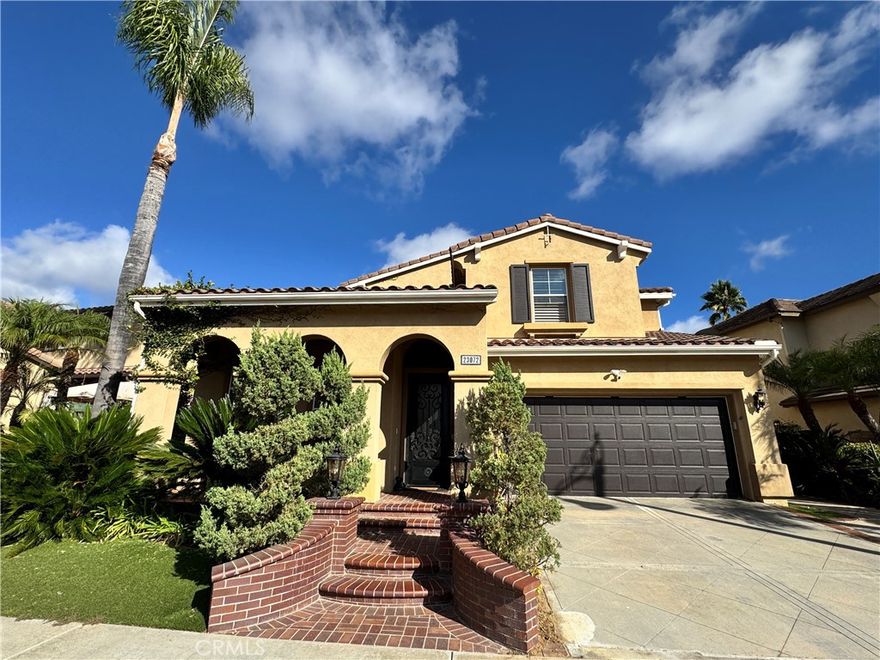 Discover Mediterranean Elegance with a Modern Resort Feel!



Step into this stunning Mediterranean-inspired residence that blends timeless design with everyday comfort. A dramatic two-story entryway welcomes you into sun-filled spaces surrounded by graceful architectural detail, stone flooring, tall baseboards, crown molding, soft neutral walls, plantation shutters, and a sweeping wrought-iron staircase that becomes the home’s striking centerpiece.



The formal living and dining rooms open through French doors to a tranquil courtyard with a bubbling fountain, the perfect spot to savor morning coffee or unwind with evening wine. The chef’s kitchen is beautifully appointed with granite countertops and backsplash, stainless-steel appliances including a Thermador multi-burner cooktop, double ovens with convection and steam features, a hammered copper farmhouse sink with reverse osmosis, pull-out shelving, wine fridge, and a generous breakfast bar adjoining a cozy breakfast nook.



An inviting family room sits just off the kitchen, offering an open-concept flow ideal for relaxation and entertaining, complete with a marble-faced fireplace and direct access to the resort-style backyard. The first floor also includes a powder bath and a well-designed laundry room with cabinets and sink.



Ascend the grand curved staircase to the serene upper level. The spacious primary suite features dual walk-in closets with custom built-ins and a luxurious spa bath with jetted soaking tub, expansive walk-in shower, and dual vanities. Three additional bedrooms provide versatile options for family, guests, office, or fitness space, all served by an upgraded secondary bath finished in stone and granite.



Now for the showstopper, the backyard retreat! Enjoy your own private oasis with a sparkling saltwater pool and spa, cascading waterfalls, a covered patio with ceiling fan and heater, and a full outdoor kitchen pavilion with granite bar seating for gatherings of any size.



Additional highlights include a 3-car tandem garage, tankless water heater, solar panels, custom entry door with decorative glass and iron, ceiling fans, lush landscaping with turf lawn, and thoughtful upgrades throughout. Conveniently located near top schools, shopping, parks, toll roads, and freeway. This home offers a rare blend of luxury, comfort, and resort living every day.



Come experience it for yourself!
