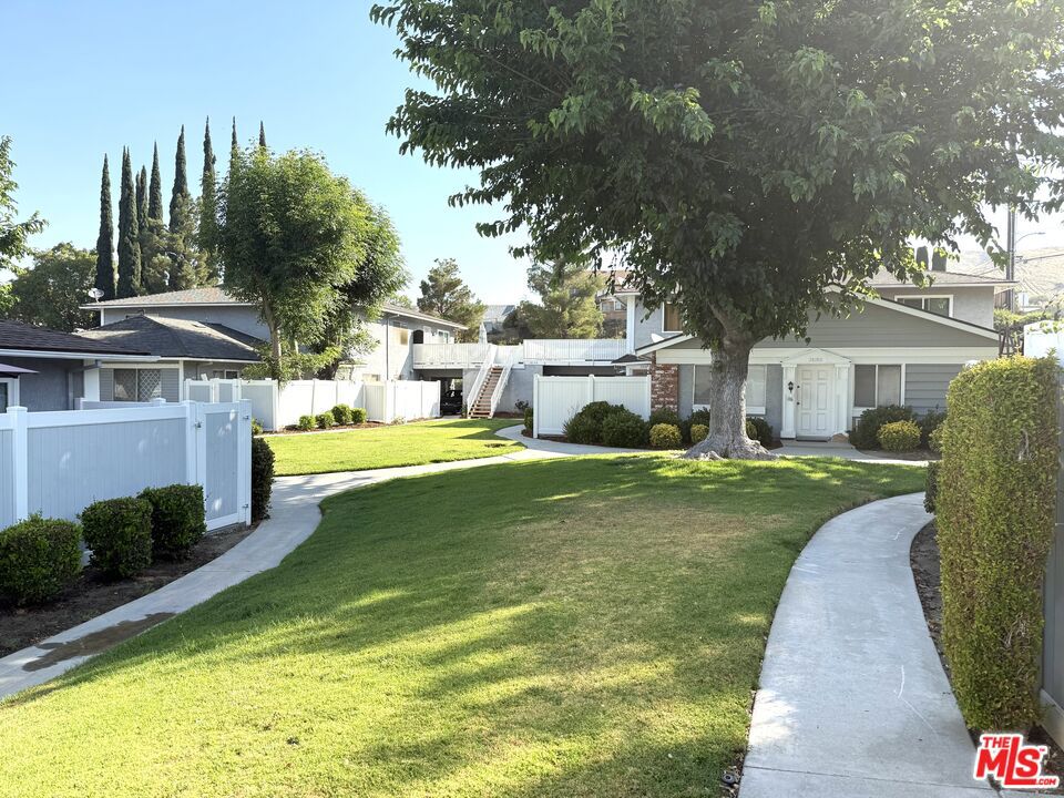 This charming home features a spacious private patio ideal for entertaining friends and family. Located on the second level with no one above or below you. The open-concept living and dining area flows seamlessly into the bedrooms...of which one includes a walk-in closet. The interior features energy-efficient windows and newer interior paint. Two covered carport spaces, plus a standard and walk-in storage unit. The community offers fantastic amenities including a park with playground, basketball court, gated pool, picnic area, and community laundry. Conveniently located near shops, restaurants, and award-winning schools. HOA includes water, trash, and sewer. Some pictures virtually staged.