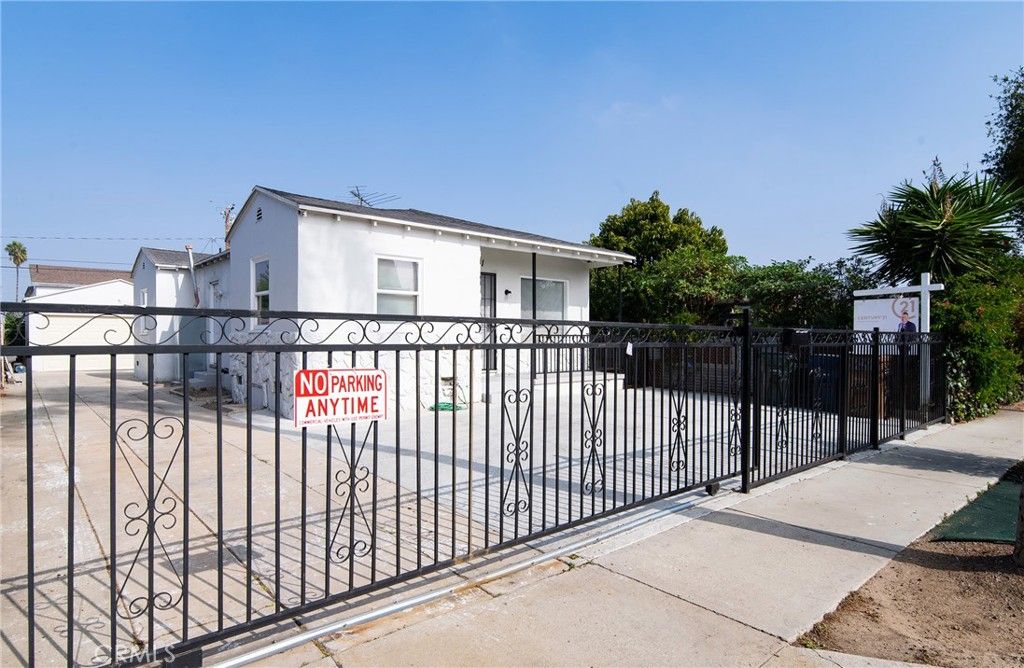 Photo of 1241 W 89th St St, Los Angeles, CA 90044 (MLS # DW26033573)