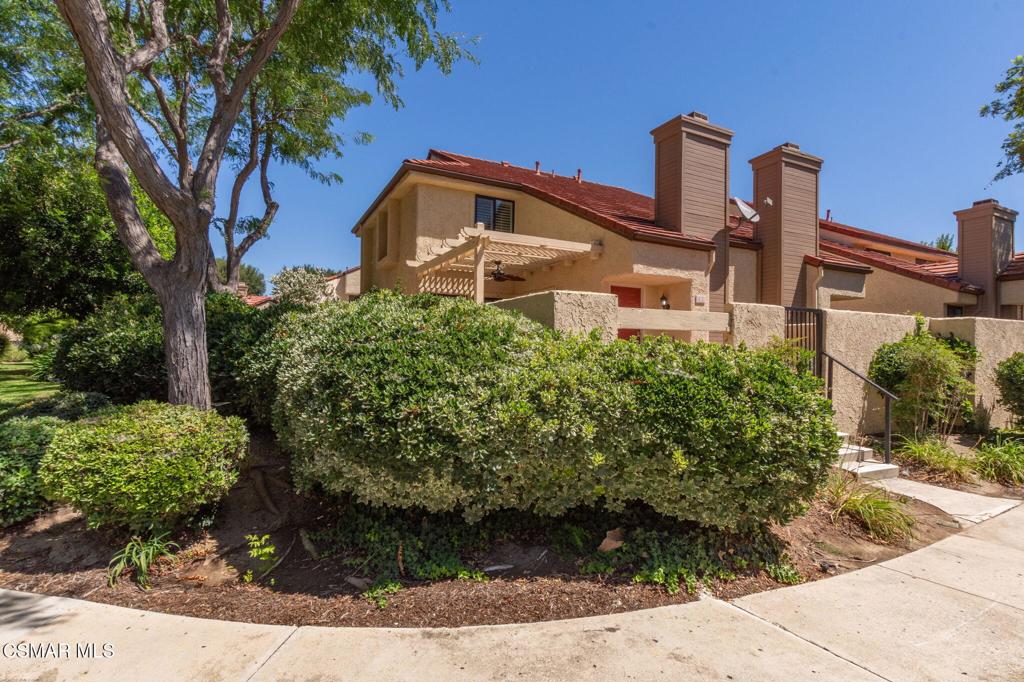 Great location! End unit with a very large covered patio area with a ceiling fan. Light & bright interior. Living room has a fireplace with vaulted ceilings and recessed lighting. There is a spacious kitchen & dining area. Kitchen has stainless appliances with a large farmhouse sink. The kitchen also has a pantry area and recessed lighting. All bedrooms have ceiling fans & mirrored closet doors. Primary bedroom with closet organizers. Primary bath has newer fixtures & recessed lighting. Hall bath also has newer fixtures, recessed lighting plus a linen closet. Beautiful plantation shutters throughout. Crown molding downstairs and in the bedrooms. 2 car garage with direct access and lots of built in storage. Low HOA dues. Great end unit!!