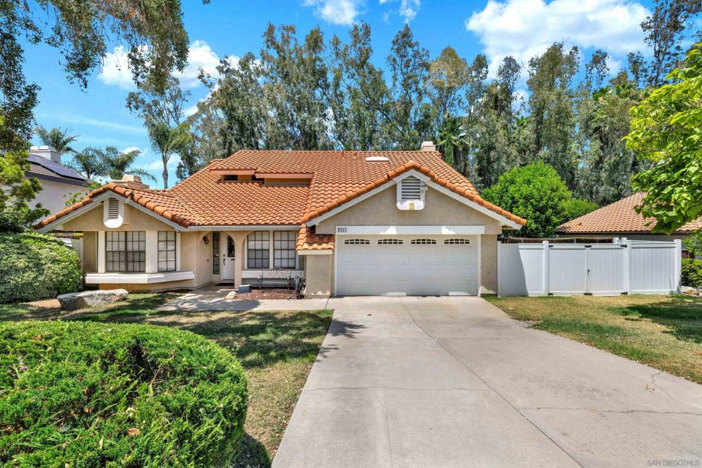 Discover comfort, space, and style in this beautifully maintained home nestled in a desirable Escondido neighborhood. With 2,435 square feet of thoughtfully designed living space, this residence offers four spacious bedrooms and three full bathrooms. Step inside to find a bright, open layout enhanced by soaring vaulted ceilings, creating a sense of airiness and grandeur throughout the main living areas. The space flows seamlessly between rooms, offering an inviting atmosphere for both everyday living and entertaining. The main-floor bedroom provides flexibility as a guest suite, home office, or multi-generational living space. Upstairs, the master suite is a true retreat, complete with a luxurious walk-in closet and serene en-suite bathroom. Each additional bedroom is generously sized, offering comfort and privacy for family members or visitors. Set on a generous 9,424 square-foot lot, the backyard invites endless opportunities for outdoor living—garden, entertain, or simply relax and soak up the California sunshine. Additional highlights include a two-car garage, modern amenities, and a location that puts you close to local shops, dining, parks, and top Escondido schools. Whether you're hosting guests or enjoying a quiet evening at home, 2010 Palsero Avenue offers the perfect blend of function and charm. Come experience it for yourself—your next chapter starts here.