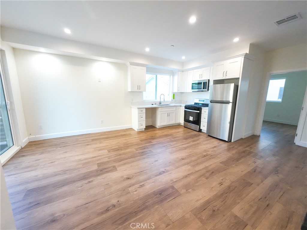 Step into comfort and style in this newly updated home featuring modern fixtures and high-quality finishes throughout. Enjoy the convenience of a fully equipped kitchen with appliances, spacious interiors, and two included parking spaces. Designed for both comfort and practicality, this home offers the perfect balance of modern living in a central Los Angeles location.