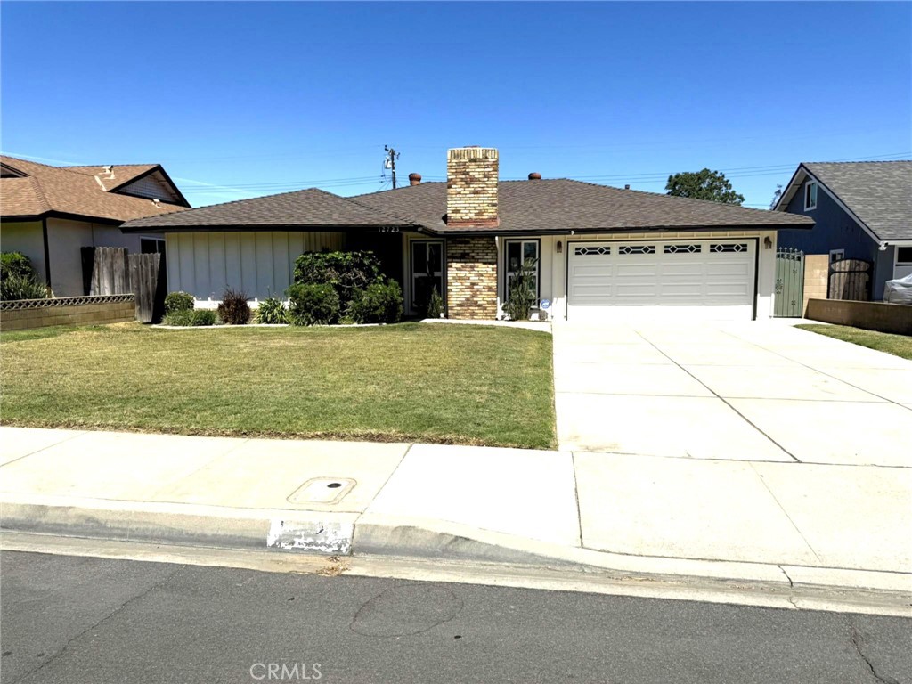 Exciting, freshly painted single-story home featuring new flooring, four bedrooms, and two newly remodeled full bathrooms. The kitchen boasts newer appliances, and the family room includes a fireplace. The house has central heat and A/C. It offers a two-car garage, a large laundry room with washer and dryer hookups, ample storage space, and a unique, very large backyard. Water and landscaping are paid by the owner, allowing the tenant to enjoy the backyard as well as the nice layout inside.