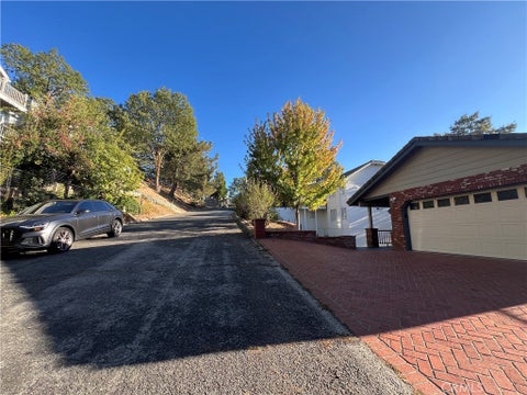 Photo of 30055 Enchanted Way Way, Running Springs, CA 92382 (MLS # CV26231269)