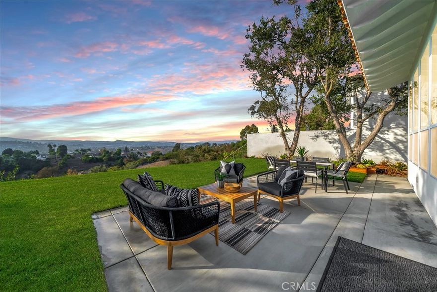 Beautifully Remodeled Laguna Niguel View Home. This stunning home has been completely reimagined with modern finishes and thoughtful design. Featuring three spacious bedrooms on the upper level with the option to create a secondary primary suite on the main floor. This residence offers incredible flexibility for today’s lifestyle. The chef’s kitchen is a true centerpiece, showcasing a Thermador Professional gas range with pot filler, 48” built-in Viking refrigerator, and a beverage/wine fridge. Expansive floor-to-ceiling windows flood the main living areas with natural light while framing, sweeping panoramic views. The primary suite is a serene retreat with vaulted ceilings, a luxurious walk-in closet complete with custom organizers and center island. The upstairs laundry room adds ease to daily living. Outdoors, the spacious backyard is perfect for entertaining or simply enjoying the breathtaking views.