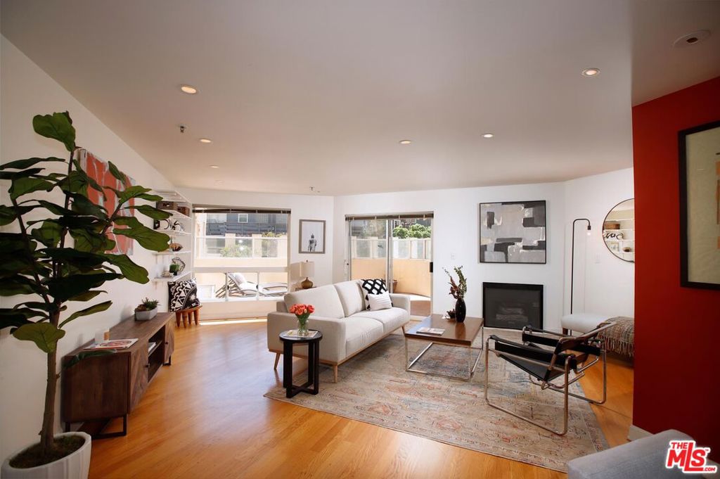Welcome to 245 Main St in the heart of Venice. This Venice Beach corner unit has amazing light throughout this open floor plan. From the Great Room, the large wrap-around balcony sits above the pool and spa, making it perfect for indoor/ outdoor living and entertaining. Feeling like a night swim? You've got the best and easiest access to the pool and spa. The Great Room and Dining Room have hardwood floors that warm up this bright and airy space. The kitchen has been tastefully updated with white Caesarstone counters, Italian ceramic tiles, and stainless steel built-in appliances. The primary bedroom has custom Shoji screen closet doors with built-in California closets for extra storage. Custom bamboo and acrylic privacy screens are off both bedroom priv ate patios. The ensuite bathroom boasts a KOHLER Soaking Tub, dual sinks and ceramic tile flooring that round out the perfection of this bathroom. The guest bedroom has the perfect patio for your Peloton or exercise area. Fall out of bed and land in the heart of shopping, entertainment and dining in Venice and Santa Monica. Just one block to the beach, Venice Living at its absolute best! End unit, one floor, no step down, wrap around balcony/patio this unit sits above Main street, facing west for maximum privacy, in the Renaissance Building with retail on the ground floor with plenty of guest parking.