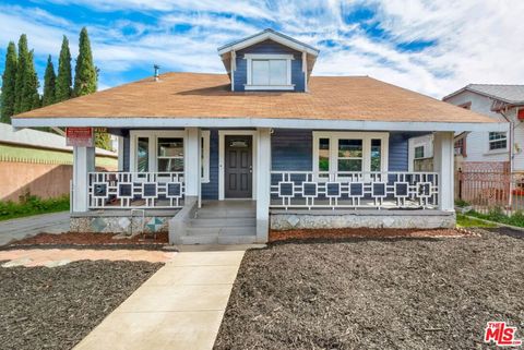 Photo of 4312 Walton Avenue, Los Angeles, CA 90037 (MLS # 26663515)