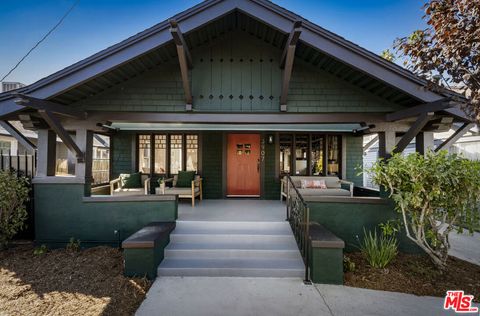 Photo of 3907 Walton Avenue, Los Angeles, CA 90037 (MLS # 25612257)