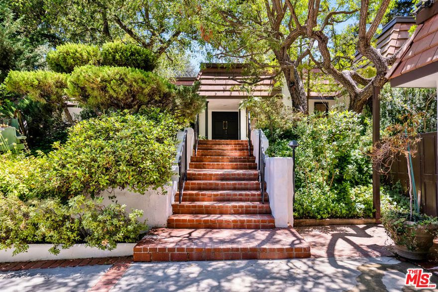 Beautifully updated single level Calabasas Park gated family home. Recently remodeled on a huge 18k sqft lot. A privately gated driveway leads you to an expansive 5 bedroom and 4 bathroom garden sanctuary. Bright and open floor plan with white oak flooring and high ceilings. Multiple skylights bring in tons of light. Brand new chef's kitchen with modern appliances, oversized island, and butlers pantry. Large primary suite with patio access to the yard. Peaceful zen backyard that has been professionally landscaped with exotic trees and plants. Located in prime Calabasas, walking distance to the commons and Calabasas lake.