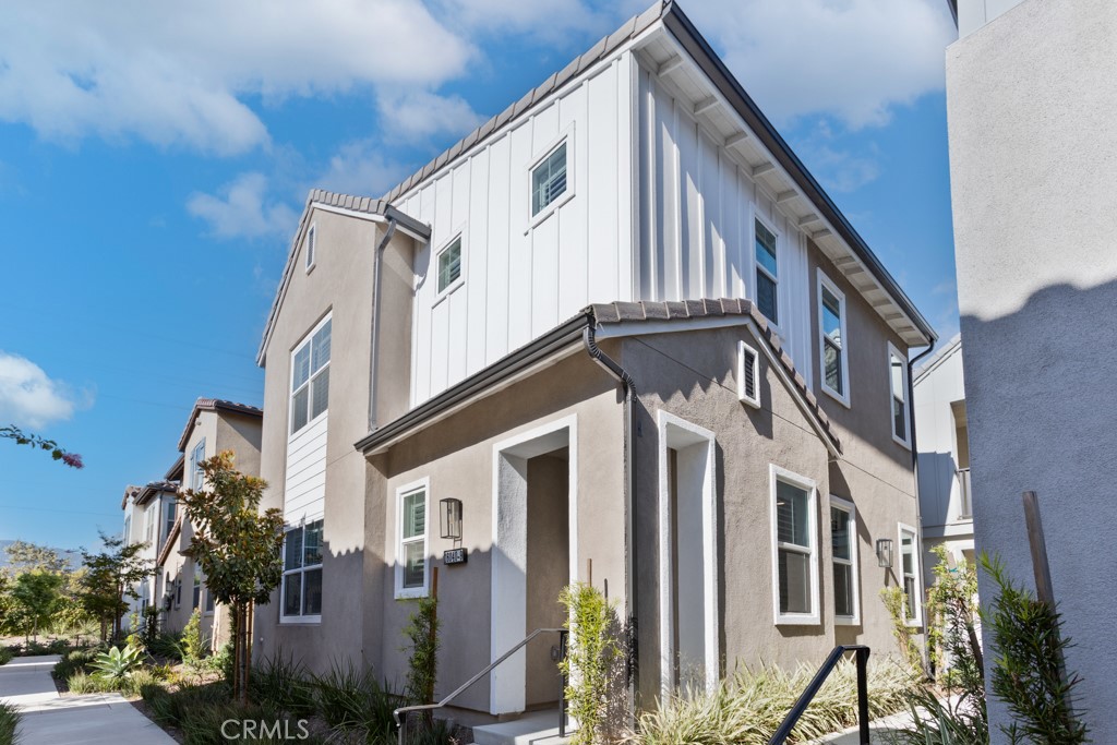 Welcome to 16040 Jamie Ln. Unit 9, a beautifully designed 4-bedroom, 3-bathroom home nestled inside the highly sought-after Shady Trails gated community in North Fontana. Built in 2023, this modern two-story residence blends comfort, style, and convenience with thoughtful details throughout its 1,611 sq. ft. floor plan.
Step inside to discover an open-concept living area with soaring ceilings, recessed lighting, and abundant natural light. The chef-inspired kitchen features sleek quartz countertops, stainless steel appliances, and crisp white cabinetry—perfect for daily cooking or entertaining. A full bedroom and bathroom downstairs offer flexibility for guests, in-laws, or a private home office.
Upstairs, the luxurious primary suite awaits with a massive walk-in closet and a spa-like bathroom complete with dual vanities. Two additional bedrooms, a full bathroom with double sinks, and a convenient upstairs laundry room complete the upper level.
Living in Shady Trails means enjoying access to resort-style amenities: pools, spas, fitness centers, playgrounds, dog parks, barbecue areas, and two exclusive recreational hubs—The Parkhouse and The Retreat. The community is pedestrian-friendly with sidewalks, green spaces, and nearby parks.
With top-rated schools, shopping, dining, and recreational spots like Sierra Lakes Golf Club and the Fontana Park Aquatic Center just minutes away, this home offers both a modern lifestyle and a vibrant community setting.
