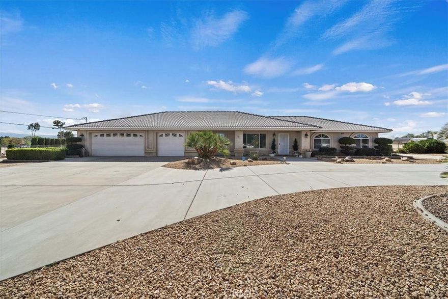 Welcome to this stunning 4-bedroom, 2-bathroom home in Hesperia, set on nearly 1.5 acres. The open, newly remodeled kitchen with a cozy nook flows seamlessly into the family room, living room, and dining area, perfect for both everyday living and entertaining.



The property features a three-car attached garage, circular and side concrete driveways, and beautifully landscaped grounds that enhance its curb appeal. Enjoy serene mountain views and quick access to the 15 Freeway from this quiet location.



A spacious, fully equipped workshop adds incredible versatility, with two large roll-up doors, a side entrance, 110/220V power, water, interior sink, concrete floors, built-in shelving, workbenches, fluorescent lighting, and full drive-around access. Multiple drive-through gates provide ample space for RV entry and storage, both inside and outside the workshop, offering endless potential for work, living, or cash flow opportunities.



This home combines comfort, functionality, and versatility perfect for families seeking space and possibilities. Don’t miss this opportunity to own this gem!
