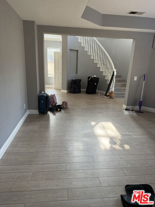 Beautiful former model home in the prestigious gated community of Threewoods, located in desirable Fullerton Hills with scenic views. This spacious home offers 5 bedrooms and 4.5 bathrooms, including a main-level bedroom with a full bath. The open floor plan features a family room, living room, formal dining area, and gourmet kitchen.The luxurious primary suite includes a soaking tub, separate shower, and walk-in closet. Additional features include central A/C, abundant natural light, a covered patio for outdoor enjoyment, and a 3-car garage.Located near award-winning Beechwood K-8 School, Troy High School, Cal State Fullerton, and Fullerton College. Convenient to Downtown Brea and Fullerton for shopping, dining, and entertainment. Easy access to the 57, 90, and 91 freeways, Fullerton Loop Trail, and Coyote Hills Golf Course.