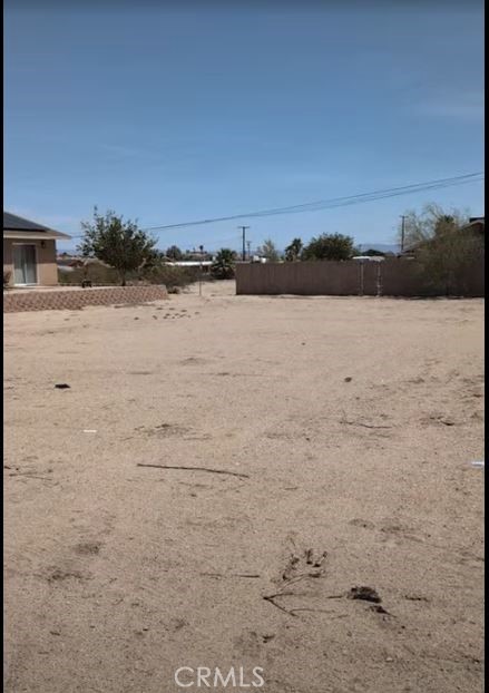Prime West-Facing Lot in Smoke Tree – Ready to Build!
Discover the perfect canvas for your desert dream home in the sought-after Smoke Tree neighborhood of 29 Palms. This flat, scraped, and graded lot is construction-ready, offering a seamless path to development with utilities available at the street.
Ideally located just minutes from downtown 29 Palms and the transformative Project Phoenix—featuring the upcoming Joshua Tree National Park Visitor Center and Community Center—this property places you at the heart of a vibrant and evolving community.
Enjoy panoramic views of the iconic 49 Palms Canyon right from your front yard, a rare and breathtaking vantage point into one of Joshua Tree National Park’s most beloved inlets. Whether you're seeking a serene retreat or a strategic investment in the Morongo Basin, this lot delivers location, potential, and natural beauty in equal measure.