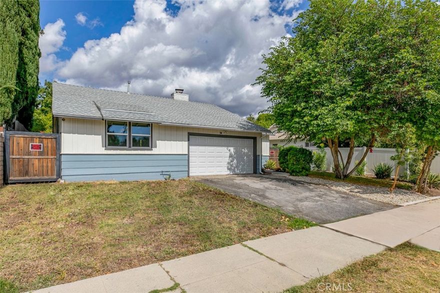 Welcome to this stunning 3-bedroom, 2-bathroom remodeled home located in a sought-after Granada Hills neighborhood. Offering approximately 1,326 square feet of thoughtfully updated living space, this property blends modern design with comfort and functionality. Step inside to discover a bright and open layout featuring tasteful finishes, updated flooring, and a beautifully renovated kitchen with quartz countertops, contemporary cabinetry, and stainless-steel appliances. The spacious living and dining areas provide a natural flow that’s ideal for relaxing or entertaining. Outside, enjoy an exceptionally large and flat lot of approximately 11,422 square feet, a rare find in Granada Hills. The expansive outdoor space offers plenty of room for recreation, gardening, or possible future improvements.