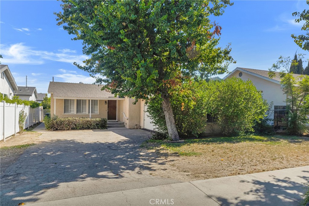 Conveniently located in the heart of Northridge near CSUN, this charming home sits on an interior lot away from busy streets and offers a blend of comfort and practicality. Fresh interior paint, brand-new carpet, and luxury vinyl plank flooring create a bright and inviting atmosphere throughout. The spacious layout features a large living room and dining area, perfect for gatherings. Enjoy year-round comfort with central refrigerated A/C and forced-air heating. Additional highlights include an indoor laundry room for everyday convenience, a two-car attached garage with a generous driveway, and a large lot with a big backyard offering endless potential for entertaining, gardening, or future expansion. A wonderful opportunity in a sought-after location!