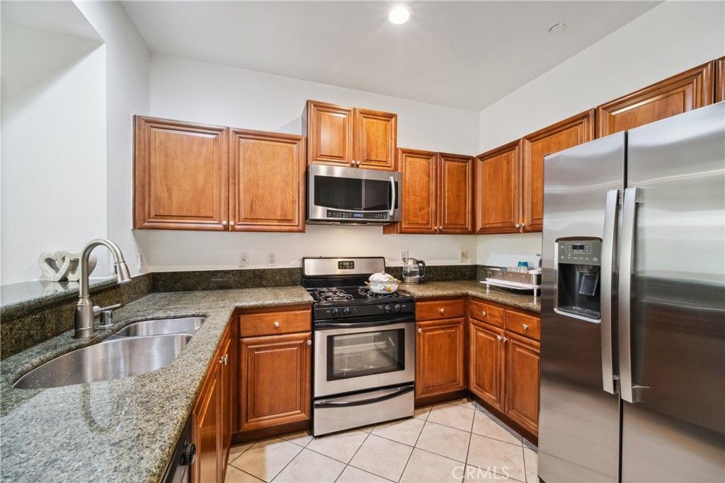 Photo of 13951 Sherman Way #204, Van Nuys, CA 91405 (MLS # PW26005619)