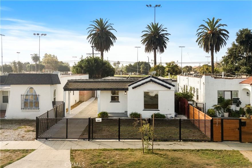 Welcome to this Spanish-style home situated in the heart of Los Angeles, the impeccably remodeled 2 bedrooms, 1 bath home boasts the perfect blend of classic architecture and modern comfort. Enjoy the spacious living area, where natural light pours in through large dual pane windows, creating an inviting ambiance. The open concept kitchen is a chef's delight, complete with large quartz countertops, appliances, and plenty of cabinetry space for all your culinary needs. The two generously sized bedrooms offer plenty of room and the renovated tiled bathroom makes it the perfect turn-key home. Also equipped with new ductless split A/C unit in the living room, new vinyl flooring throughout, and fresh paint inside and out. This fully gated home also comes with a large driveway for up to 5 cars and a 2 car detached garage, also the inviting large backyard leads to a beautiful park with baseball, tennis courts and a rubber track to jog or walk for a healthy lifestyle.
