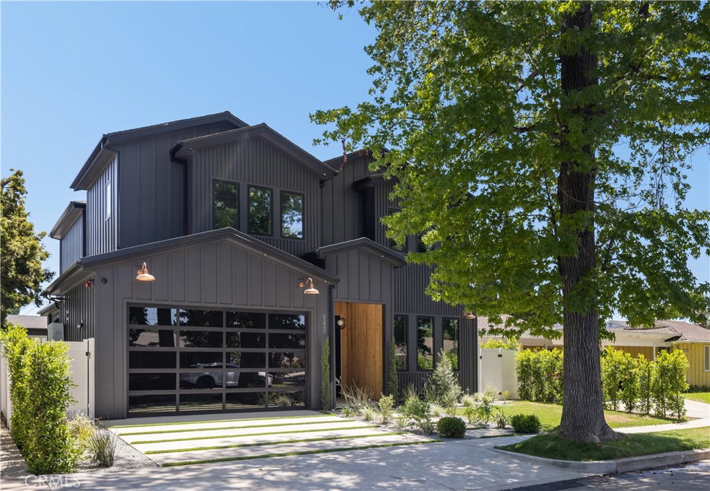 Spectacular Modern Farmhouse situated in the prestigious Sherman Oaks pocket, a neighborhood known for its charm and community spirit. This stunning five-bedroom, 5 1/2-bathroom masterpiece spans approximately 3,500 square feet of luxurious living space on a generous lot. Designed and meticulously crafted with a keen eye for the finest designer finishes, it offers breathtaking aesthetics and comfort, creating a unique, welcoming atmosphere.As you step inside, you're greeted by an open, free-flowing layout bathed in natural light, enhancing the home's stunning features and innovative design. This home is outfitted with state-of-the-art smart home technology, putting control and convenience at the touch of a button.At the heart of the home lies a custom chef's kitchen, equipped with top of the line appliances, and ample space for preparing gourmet meals. From quick breakfasts to elegant dinner parties, this kitchen serves every occasion with ease.The main bedroom, a sanctuary of calm and opulence, is paired with an ensuite bath for a resort-like experience, surrounded by natural wood and privy to the home's brilliant design.Outside, the property continues to impress. A sprawling, private backyard creates a resort-like ambiance, complete with a sparkling pool, spa, and beautifully designed barbecue area. The grounds are delicately landscaped with mature Ficus trees and an elegant cabana, perfect for entertaining on warm summer nights or simply unwinding after a long day.Don't miss the opportunity to own this unique Modern Farmhouse, a symbol of timeless elegance and sophistication. Experience the perfect blend of lifestyle and luxury at 5222 Ventura Canyon Avenue.