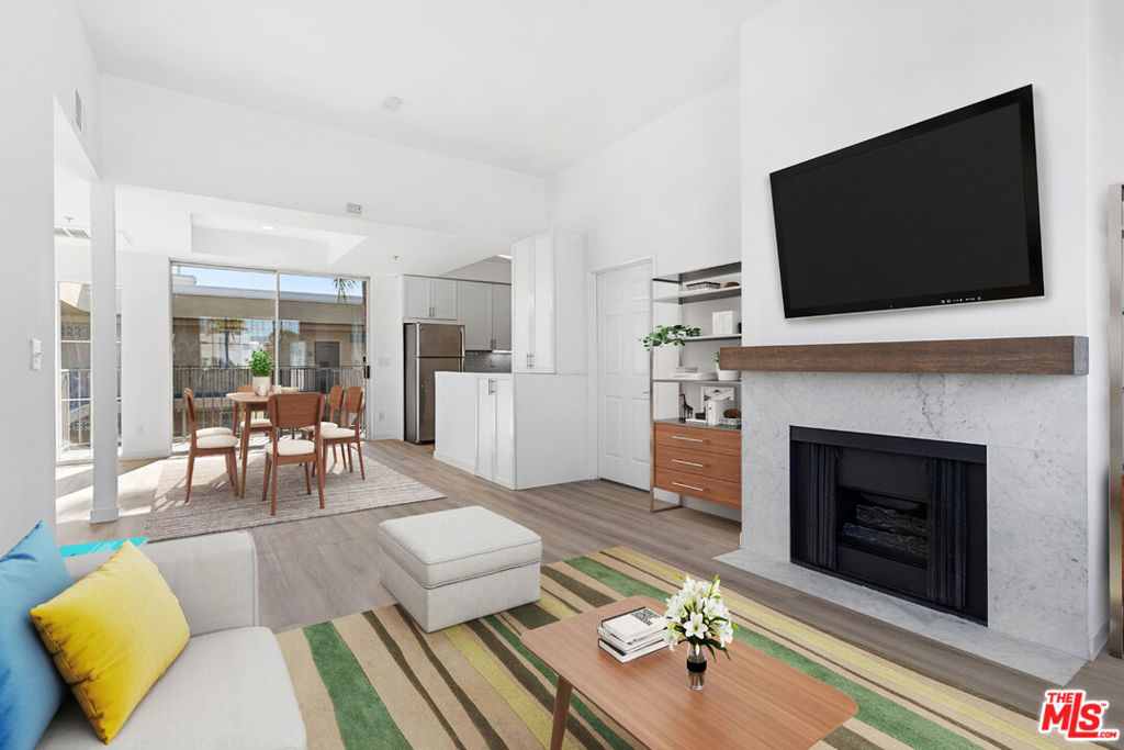 1661 Bundy, a newer complex from Nayssan Properties. This bold and contemporary newer building with an amazing VERY LARGE 2-bedroom, 2 bathroom PENTHOUSE unit on a very beautiful and quiet street. UNIT 305 is a QUIET, REAR unit with beautiful views. LARGE BEDROOMS which are separate from each other which is great for privacy! The apartment has a spacious open floorplan with high ceilings and fireplace and LARGE BALCONY! Bedrooms are large with plenty of closet space. Equipped with great appliances. IN UNIT WASHER DRYER! Two parking spaces included! Located right below Santa Monica Blvd making it an ideal central location. Close distance to famous San Vicente Blvd. where you can enjoy the great restaurants, bars, nightlife, Whole foods, Farmers Market, etc. Or a quick drive to Sawtelle Blvd, one of the liveliest streets in West LA with the best restaurants, cafes and shops in the area! Also ideally located close to UCLA, Westwood, and Beverly Hills. SEE REMARKS FOR SHOWING INSTRUCTIONS