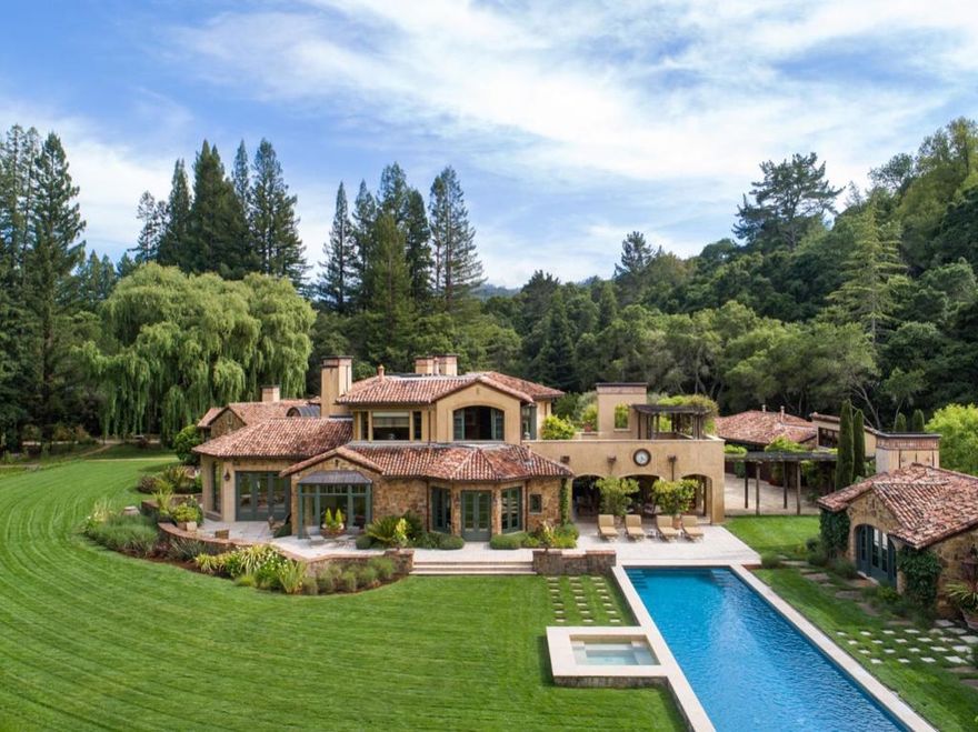 Elegant and light-filled Tuscan estate expertly designed with unparalleled attention to detail. Stunning architectural elements imported from Italy add texture and a sense of history. An entry featuring a brick barrel ceiling, hand-carved doors, limestone terraces and a carved wood ceiling salvaged from a Venetian villa are just a few of the features that transport you to the Italian countryside. The loggia opens to the pool terrace with a view of the sun-drenched meadow. The structures were carefully positioned to take full advantage of the natural beauty of the setting. Dine al fresco in a redwood grove with an electric chandelier, walk along the meandering stream, play a spirited game of tennis or bocce ball and gather flowers, fruits and vegetables from the garden.  A secluded oasis with easy access to all that living in the Bay Area has to offer. Estate includes a 1400 sf guest house, a 775 sf caretaker's cottage, and a 3 car garage and gym.