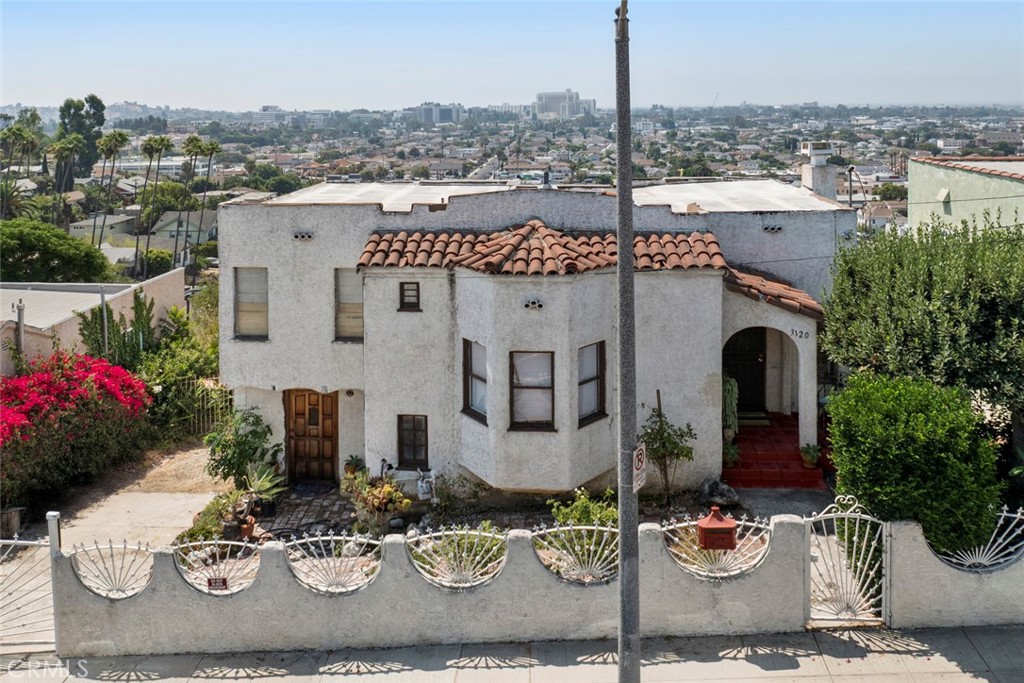 Lincoln Heights Hilltop Gem with Panoramic Views
Perched at the top of a quiet street, this charming 2-bedroom, 1-bath home offers breathtaking city lights and sweeping views of Downtown Los Angeles. Situated at the end of the road, it provides both privacy and serenity while still being close to everything LA has to offer.
The main level features two bedrooms, a full bath, a dedicated dining room, and a bright living area that frames the skyline. Below, a finished basement spanning the full footprint of the home offers incredible bonus space with endless possibilities—perfect for a creative studio, home office, gym, or future ADU conversion (buyer to verify).
This is the first time this home has ever been on the market, making it a truly rare opportunity in historic Lincoln Heights.
Don’t miss your chance to own a hillside retreat with unbeatable views just minutes from Downtown LA, major freeways, and local hotspots.