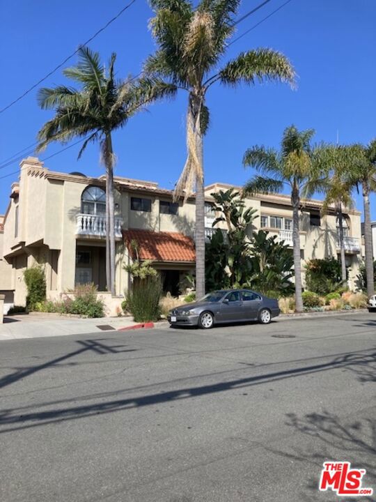 Welcome to Redondo Beach! This light-filled 3-bedroom, 2.5-bath end-unit townhome is ideally situated west of Pacific Coast Highway and less than a mile from the sand, surf, and many award-winning Redondo Beach schools. Stroll to King Harbor Marina, local shops, restaurants, gyms, farmers markets, and the lively "BeachLife Festival" with no need to pay for parking! Inside, the bright, west-facing family room with soaring ceilings flows seamlessly out onto your own private patio. After a hard day's work, kick off your shoes, grab your favorite beverage, and enjoy ocean breezes and sunsets. With 1,665 sq. ft. of versatile living space, the split-level layout offers privacy and flexibility, making it ideal for roommates, multi-generational living, a dedicated office, or a workout space, if desired. Additional features include an attached 2-car garage tucked away from the street for added privacy, in-unit washer & dryer hookups, multiple balconies and patios, and newer flooring. This spacious, move-in-ready home captures the best of South Bay living. Don't miss your chance to make it yours!