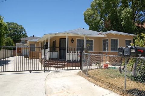 Photo of 667 N Towne Avenue, Pomona, CA 91767 (MLS # TR26018484)