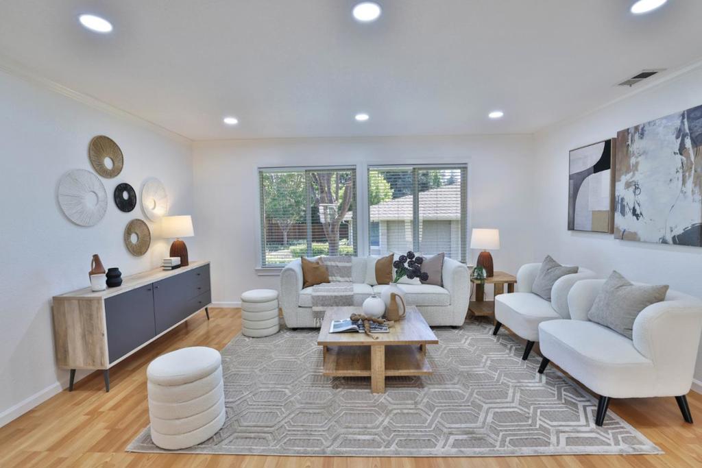 Nestled in a quiet cul-de-sac, 1510 Lima Ct offers the perfect blend of comfort, functionality, and community living. This thoughtfully designed 2-bedroom, 1-bath home spans 900 sq ft and lives much larger with its smart layout and inviting spaces. Step into the bright and airy living room where a cozy fireplace sets the tone for relaxed evenings. The adjacent dining area flows seamlessly into a well-appointed kitchen, ready for home-cooked meals and easy entertaining. Stay comfortable year-round with central A/C and forced air heating. Enjoy beautifully maintained flooring throughout, a detached 2-car garage connected to the yard, and a private setting that feels like your own peaceful retreat. Low HOA dues give you access to wonderful community amenities, including a sparkling pool, perfect for summer fun and neighborhood gatherings. Located in the vibrant city of San Jose, this home offers unbeatable value for first-time buyers, downsizers, or investors. Don't miss this opportunity to own a charming slice of Silicon Valley!