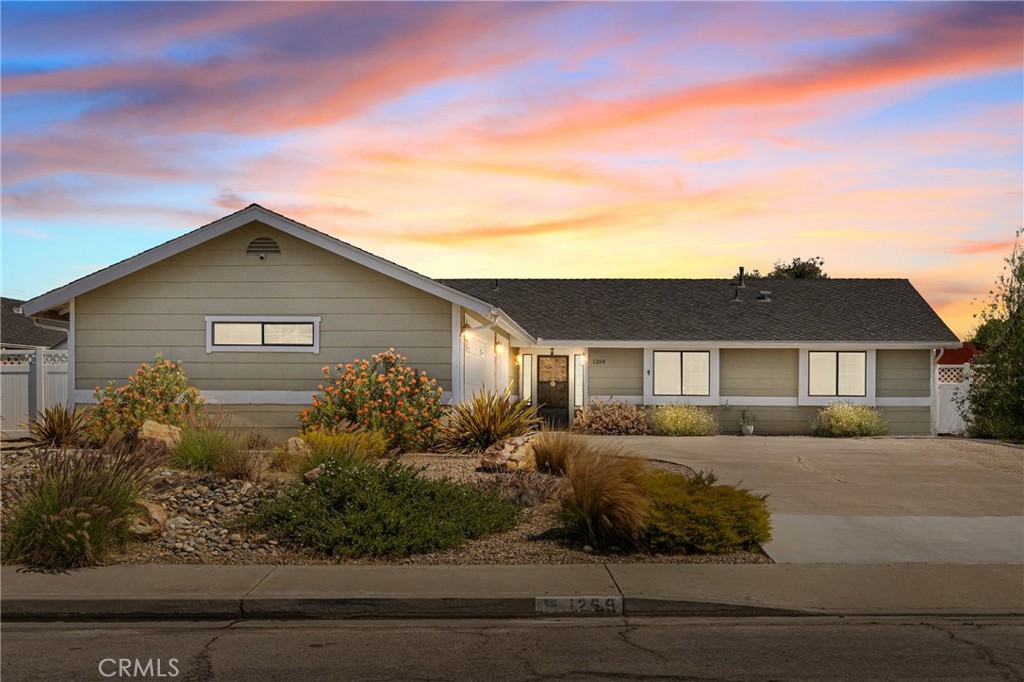 Modern comfort meets outdoor charm at 1269 Country Hill Rd in Orcutt. This inviting 3-bedroom, 2-bathroom home spans 1602 sqft on a generous 9583 sqft lot, offering ample space inside and out. It's ideally located within the highly sought-after Orcutt School District Step inside to discover recent upgrades designed for contemporary living. You'll find brand new LVP flooring throughout and newly tiled showers in both bathrooms. The kitchen shines with elegant granite countertops and recessed lighting The primary bedroom boasts a convenient walk-in closet, and for ultimate ease, laundry is neatly situated in a closet within the house. Beyond the interior, the possibilities are endless for entertainment. The 3-car garage, transformed with epoxy flooring, is a fantastic family entertainment zone. The living room is ready for movie night, featuring an impressive 150-inch projector screen and projector, both included for a true cinematic experience. Outside, your private oasis awaits. The backyard is a true gem beautifully landscaped with a lush lawn and stamped concrete. The convenient shed and canopy are also included, providing additional storage and shaded enjoyment. This move-in-ready property combines stylish updates with incredible entertainment features, a desirable outdoor space, and the benefit of a top-rated school district.