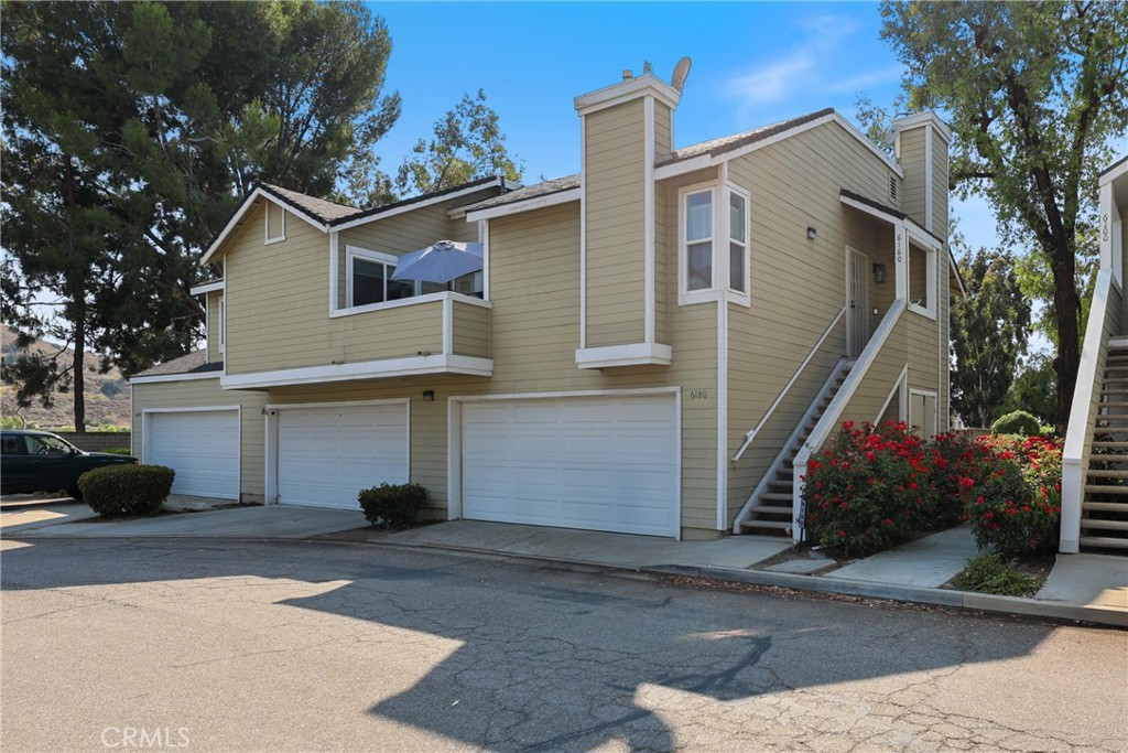 Nestled within the serene, park-like setting of the Villages of Yorba Linda, 6180 Old Village Rd #64 is an inviting modern end-unit condominium. Fully updated and turnkey, this light-filled 1,112 SQ FT home offers 2 bedrooms + 2.5 baths, including two upstairs primary suites. New paint throughout the home with brand new recessed lighting in living room and suites. Spacious living area on the first floor, centered by a cozy gas fireplace—ideal for relaxed evenings. Efficient layout: a half-bath downstairs and direct access from fully attached 2-car garage (equipped with EV-charging outlet). Outdoor living: a private, fenced patio accessible from the dining area. The Villages complex features 330 homes connected by lush landscaping, offering a clubhouse, picnic area, BBQ, playground, pool & spa. HOA dues include water and trash—providing maintenance-free living in a beautifully curated environment.
