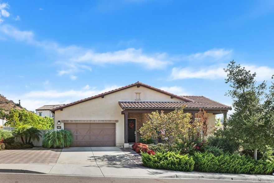 Welcome to your dream home! This single level stunner is nestled in the highly desirable Canyon Grove Community and is an entertainers dream. With its newer construction and thoughtful design, this home offers the best of both worlds: modern luxury and easy, low-maintenance living. Whether you are preparing a home cooked meal or hosting a dinner party, this kitchen is built to inspire - equal parts beautiful and practical. It features an open concept layout that flows seamlessly into the dining and living areas creating a warm and connected space perfect for gatherings. At the center, a spacious island offers additional prep space, seating and a natural place to gather. Quartz countertops, a farmhouse sink, a walk-in pantry and plenty of storage in this kitchen makes cooking and hosting a breeze. The kitchen seamlessly flows into the living area where bi-folding doors open to a breathtaking California room and a beautifully landscaped backyard sanctuary which perfectly blends indoor and outdoor living. Relax, unwind and indulge in pure relaxation in your primary suite which boasts a large walk-in closet, dual sinks and separate shower and soaking tub. Outside your private oasis awaits. Start your mornings with a cup of coffee on the shaded patio and enjoy the peaceful charm of this spacious backyard which is perfect for relaxing, gardening, outdoor dining and entertaining and is perfect for California's year-round sunshine. Additional highlights include a tandem 3 car garage with built-in storage, a charming covered front porch and laundry room complete with sink. An optional fourth bedroom offers flexibility for a home office, guest room or creative studio. Situated minutes from shopping, dining, freeways, Dixon Lake and breathtaking mountain view trails this home offers the perfect blend of convenience and accessibility for an effortless lifestyle which makes it such a special place to live. Do not miss out on this wonderful home. This is truly California living at its best!