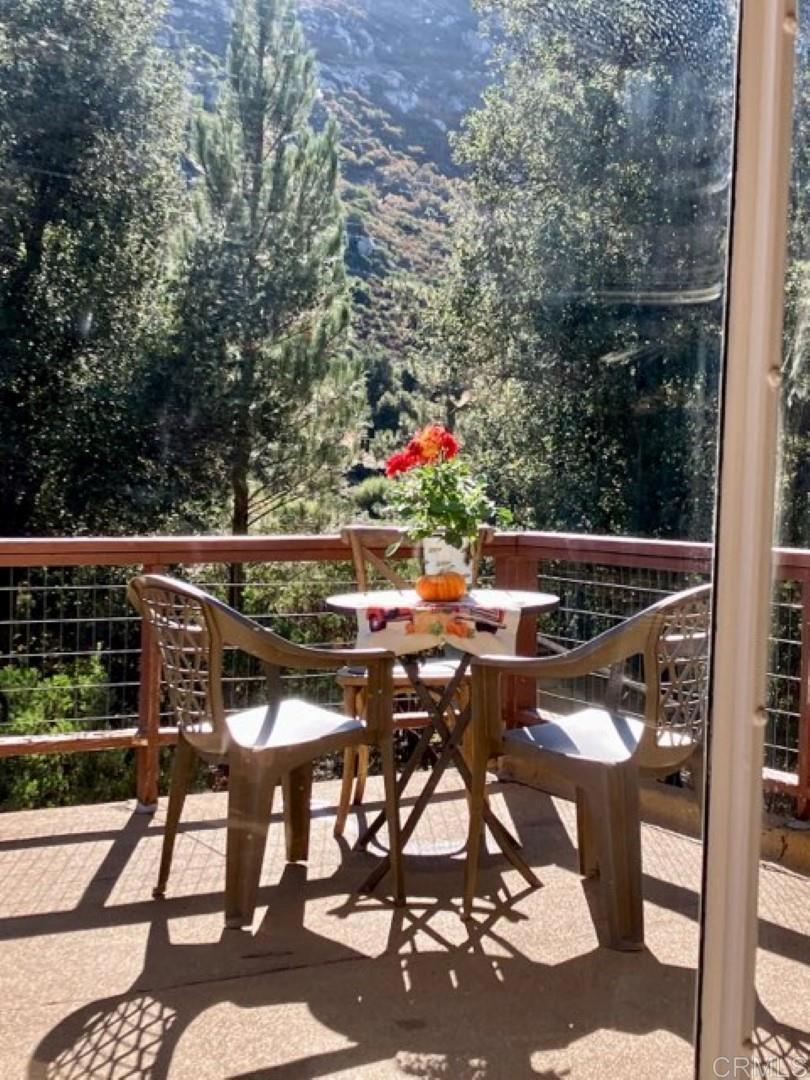 Wonderful Mountain Cabin in the Cleveland National Forest! Cabin was remodeled and updated in 2021. Enjoy hiking and biking right from your own back yard. Come experience the gorgeous views, tranquility and peace that this incredible property provides! Nestled among the Manzanita, Oaks, and Pines this cabins large windows draw the outdoors inside. Home includes open beam ceiling & large fireplace in the living room. Use the wood stove for warmth & the fireplace to set the mood. Primary bedroom has Bay type window to cozy up and take in the sights. Large deck for you to indulge in the sights and sounds of being surrounded by nature. This cabin is on leased US Forest Service land with approx. 3 years remaining on lease.