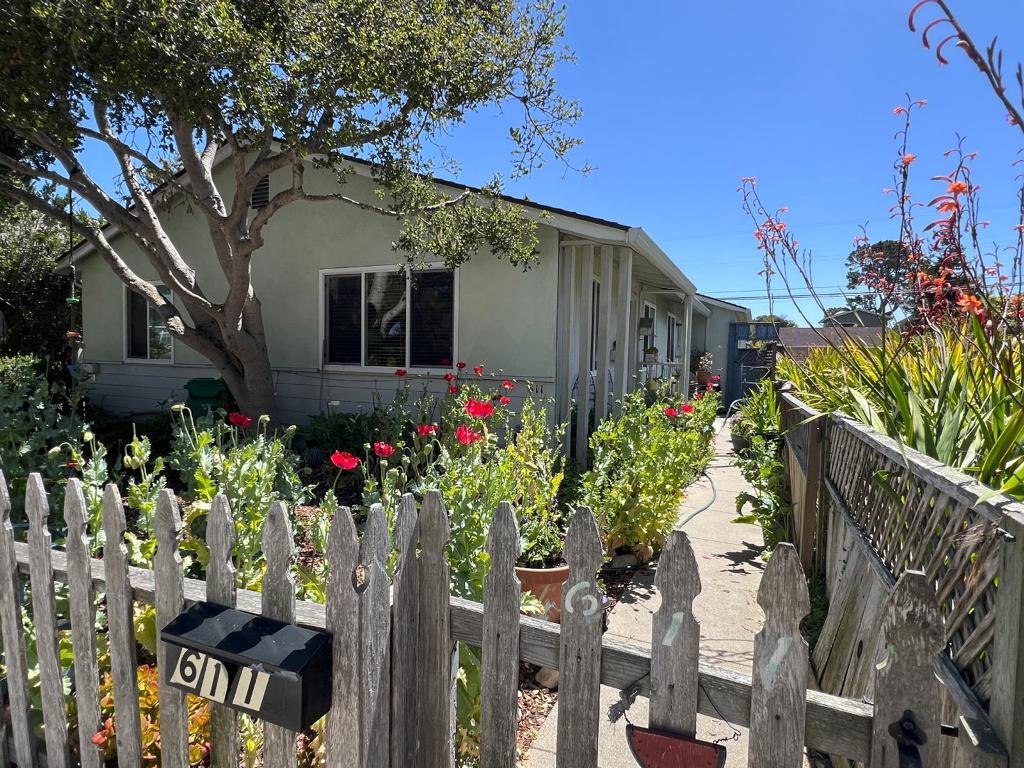 Rarely available Pacific Grove duplex featuring two 3-bedroom/1-bathroom units with washer/dryer hookups. This property can serve as a primary or second home, generating over $ 30,000 in rental income to offset your ownership costs, including mortgage, property taxes, and insurance. The units are light and bright inside. The kitchens feature tile counters, natural gas stoves and ovens, and vent hoods. The flooring is hardwood. The windows are mostly vinyl. Each unit has a private garage, which is accessed from the alley in the rear. The future owner could use both garages for their own. The units are separately metered for all utilities. The main electric panel was replaced in the last several years. Another idea is to convert one bedroom to a full primary bathroom and use the remainder for closet space or as an office, or increase the size of one of the bedrooms. One unit vacates in July 2025.
