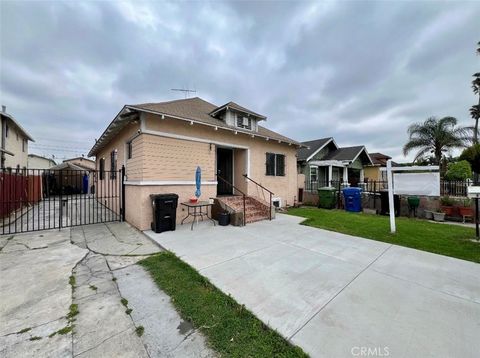 Photo of 5852 S Olive Street, Los Angeles, CA 90003 (MLS # DW26078013)