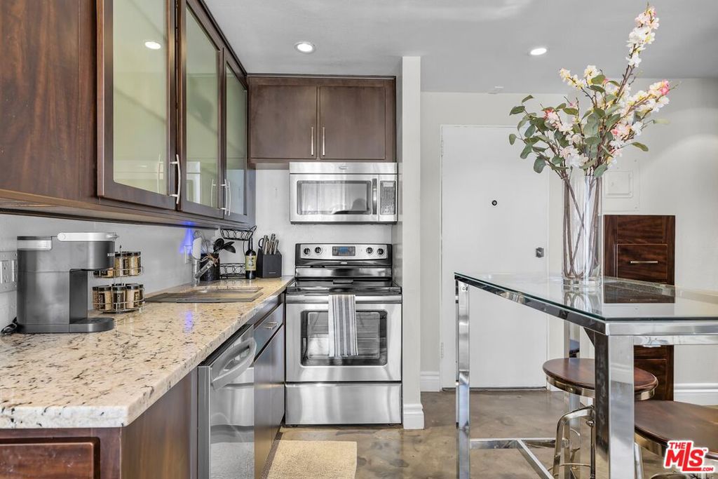 Experience the best of coastal city living in this stylish condo, perfectly situated in the heart of Downtown Long Beach. Just a short walk to the sand, shoreline paths, and vibrant nightlife, this home combines modern comfort with an unbeatable location.Inside, you'll find an open-concept layout with abundant natural light, sleek flooring, and a spacious living area ideal for entertaining or relaxing. The kitchen features updated cabinetry, stone countertops, and stainless-steel appliances. Retreat to the generously sized bedroom,as well as a studio suite complete with ample closet space, and enjoy the spa-inspired bathroom with modern finishes.Additional highlights include in-unit laundry and secure gated parking. The community offers amenities such as a fitness center, rooftop deck, and lounge areas for social gatherings.Whether you're looking for a full-time residence or a weekend getaway, this condo puts you steps away from the beach, The Pike, Shoreline Village, and dozens of restaurants, cafes, and shops. Easy access to freeways and public transit makes commuting a breeze. Prime Location + Walkability Modern Upgrades & Open Floorplan Beach, Dining, & Entertainment at Your DoorstepDon't miss the chance to own a piece of Long Beach's thriving downtown scene!
