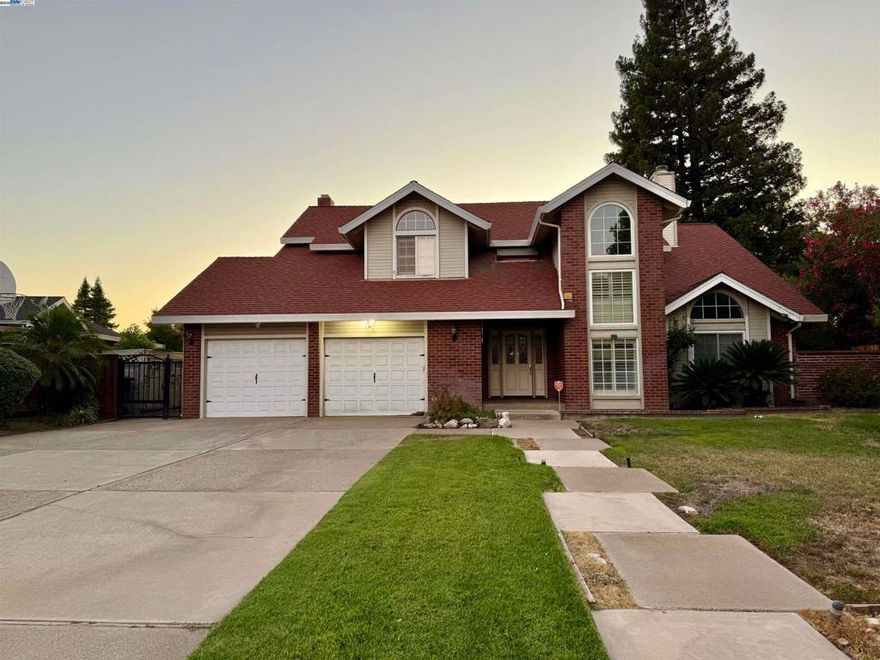 Welcome to this beautifully maintained 4-bedroom, 2.5-bath custom home located on an oversized lot in the sought-after Marsh Creek Lane in Manteca. The spacious eat-in kitchen opens to an enclosed porch with stunning custom tile flooring and a plasma hookup—perfect for summer meals or watching the game in comfort.  Step outside to your private backyard oasis featuring a covered grilling area, in-ground pool with hot tub, and an additional covered space ideal for entertaining year-round.  Inside, enjoy multiple living areas including a formal living room, dining room, and cozy family room. Polished hardwood floors, plantation shutters, and a newer roof are just a few of the thoughtful upgrades. Stay cool with a Trane AC system and enjoy low utility bills thanks to the fully installed Solar system which is completely paid off.  Included: Dishwasher, Washer/Dryer, Freezer, Garbage disposal, Microwave, Range / Oven, Refrigerator and Solar  This is more than a house—it's a place to grow, entertain, and call home. Come see why this one is a must-see!
