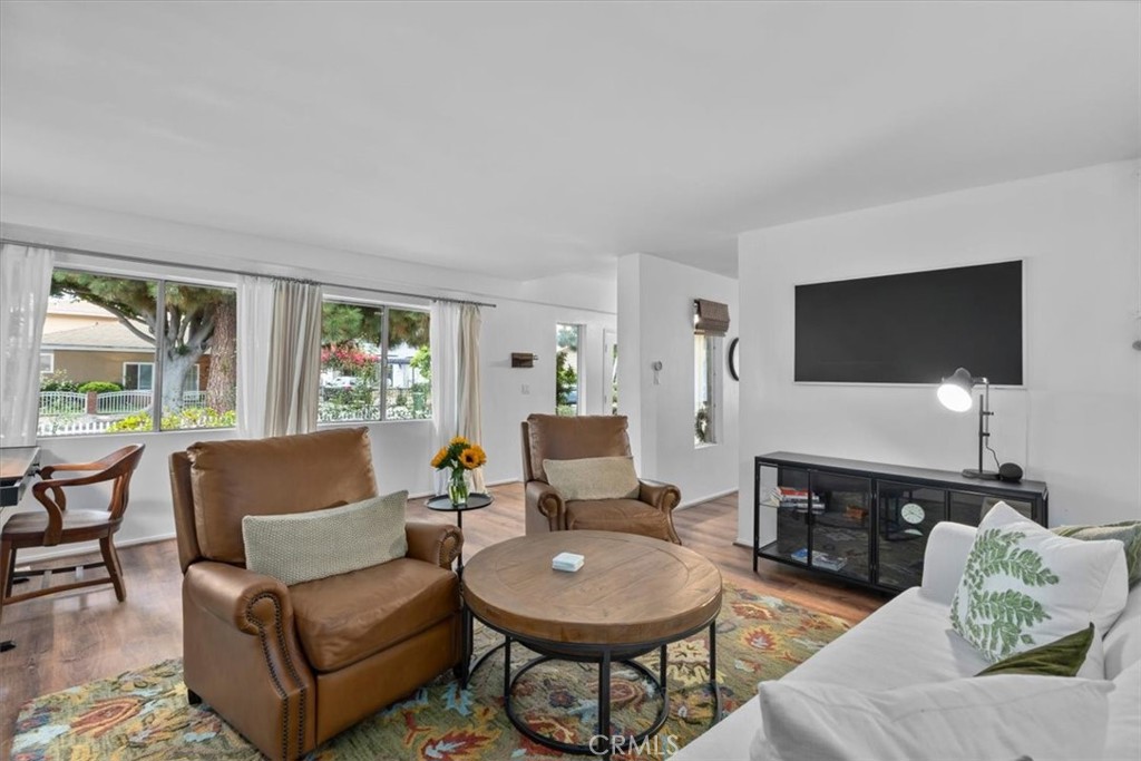 Welcome to this updated 5-bedroom, 4-bathroom home nestled on a picturesque tree-lined street in one of Culver City’s most sought-after neighborhoods - Carlson Park. Close to all of the Downtown shops & restaurants and the beloved Jackson Neighborhood Market. This residence blends classic charm with modern comfort.
Step into a spacious and sunlit living room featuring a stunning wall of windows and a cozy wood burning fireplace—perfect for relaxing or entertaining. The separate dining room adds a touch of elegance for formal gatherings, while the updated den, complete with a stylish stone-faced wood burning fireplace, offers a warm and inviting space for everyday living.
The bright kitchen boasts a new cooktop, double ovens, a charming farmhouse 40" basin sink, and a delightful breakfast nook that makes mornings something to look forward to. All four bathrooms have been tastefully updated, and the convenient inside laundry area adds to the home's functionality.
Located just minutes from vibrant Downtown Culver City, you'll enjoy easy access to renowned restaurants, unique shops, and lively cultural events. With multiple freeways nearby, reaching the beach, Santa Monica, Downtown LA, and major sports venues is a breeze.
Top-rated schools and a welcoming community atmosphere make this an ideal place to call home. Experience the perfect balance of city living and neighborhood charm—Welcome Home!
