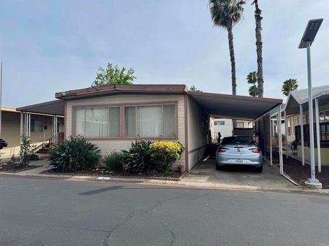 Photo of 8301 Mission Gorge Rd. Rd #54, Santee, CA 92071 (MLS # PTP2602714)