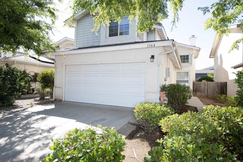Adorable 3-bedroom, 2.5-bathroom home located in town with walkability to shopping and more. Spacious living and family room. All bedrooms are upstairs. Closet under the stairway for extra storage. Indoor laundry closet, 2 car garage, fireplace in family room. Kitchen counter has room for barstools. Separate dining area. Cute private backyard and paid solar.