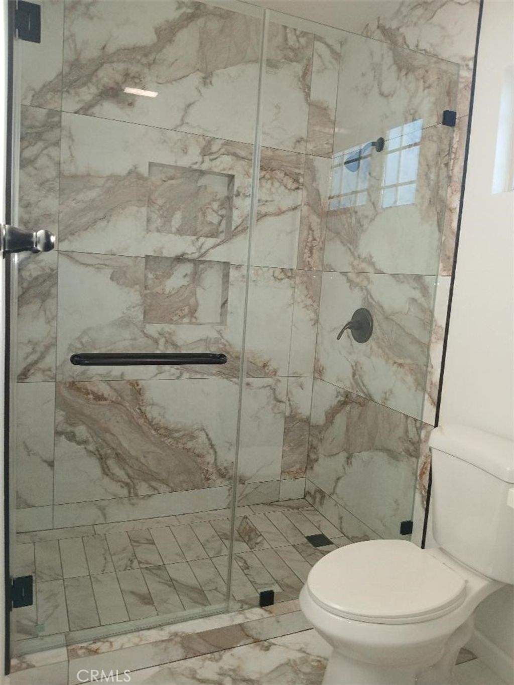 Photo of 307 N Broadacres Avenue, Compton, CA 90220 (MLS # DW26057391)